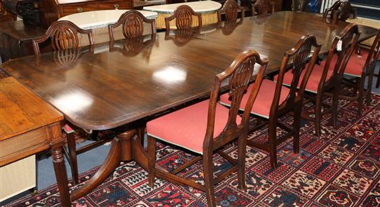 A George III style mahogany two-pillar dining table (with two additional leaves) 323cm fully extended